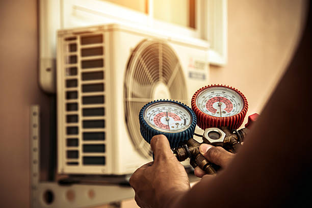 Professional Air Conditioning Service technician working in Hematite, MO